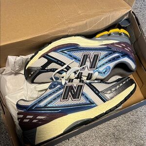 New Balance Blue and Black Athletic Shoes